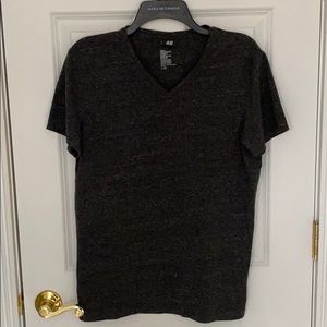 Never worn! Men’s V neck tee